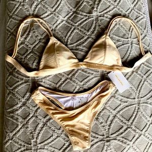 Beautiful handmade swimsuit. By Vibe and Tides NWT